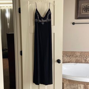 Black sequins gown. Dave & Johnny by Laura Ryner. Size 3/4.
